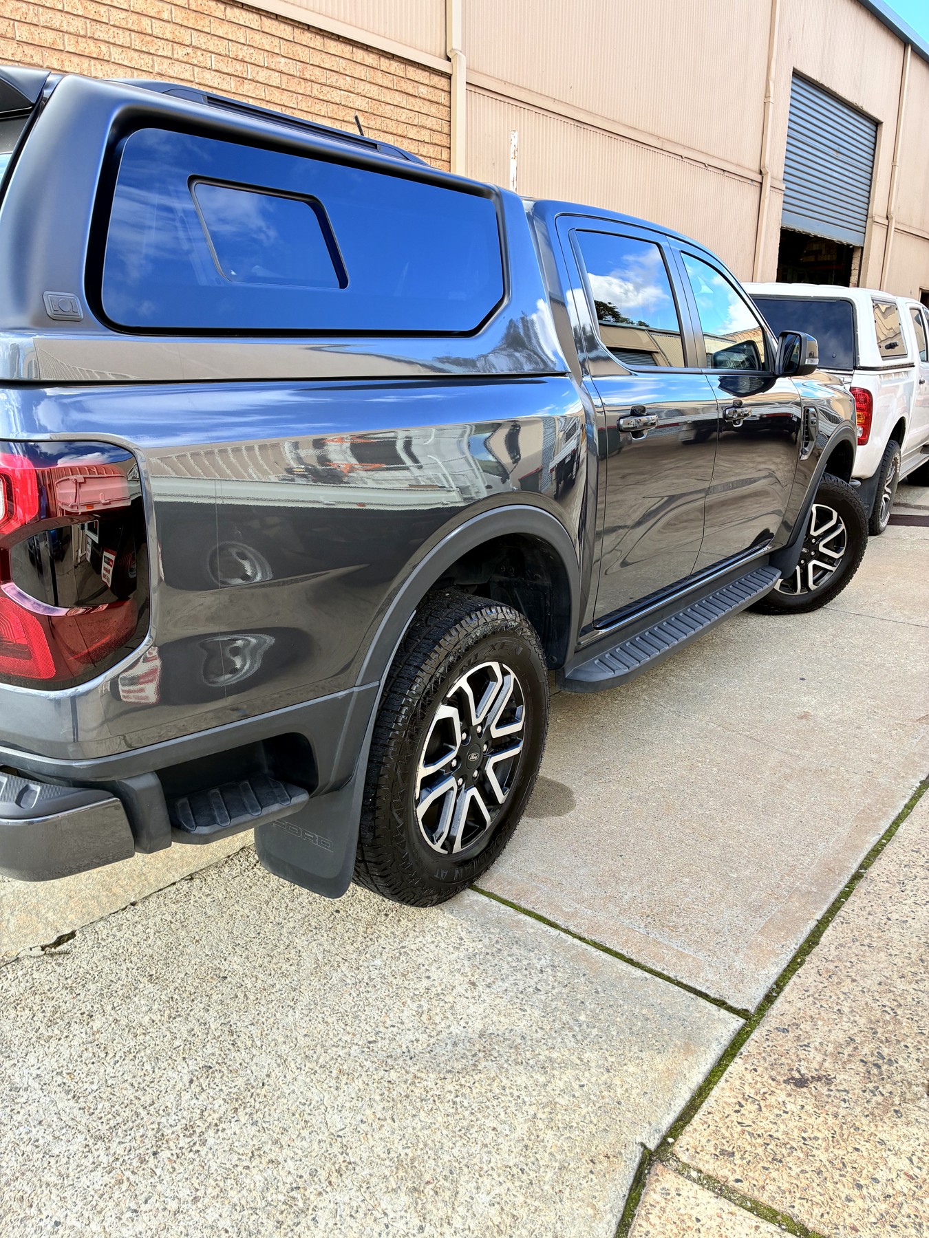 Glossy grey Ford Ranger ute with canopy after a full Squeaks exterior detail